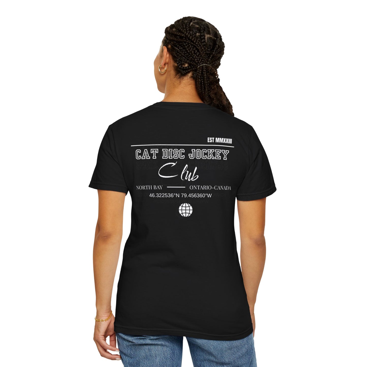 Person wearing a black t-shirt with text on the back, standing against a white background