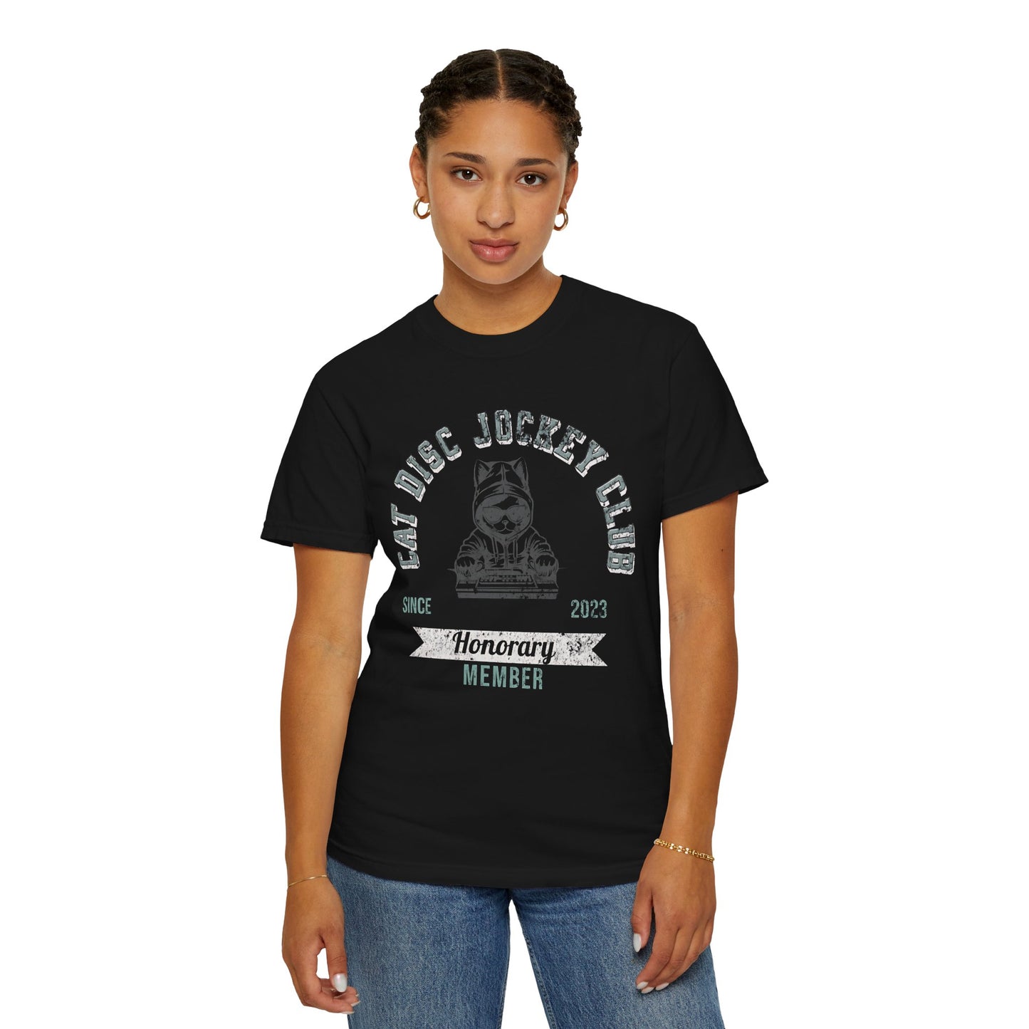 Person wearing a black t-shirt with text and graphics on a white background