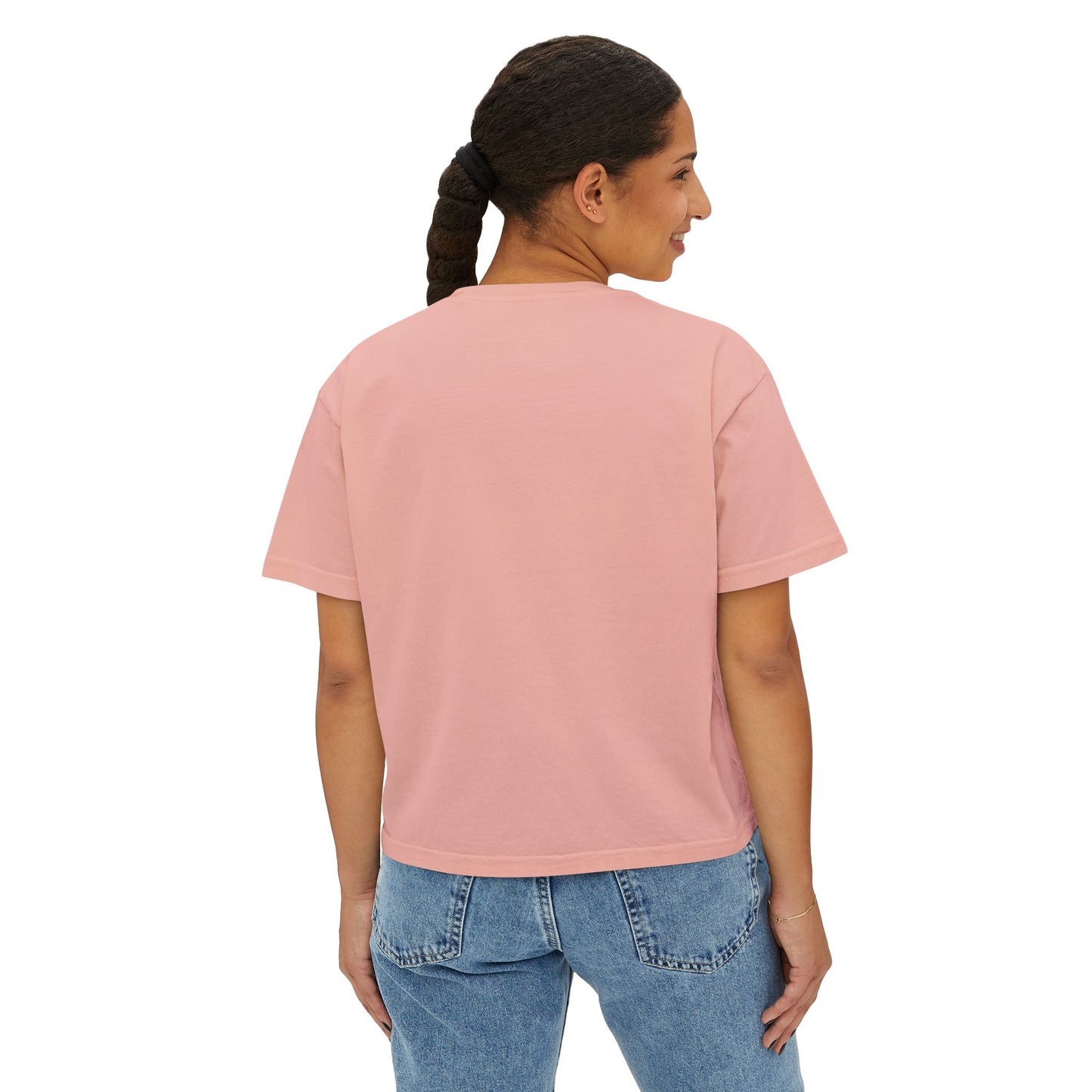 Person wearing a pink t-shirt and blue jeans on a white background