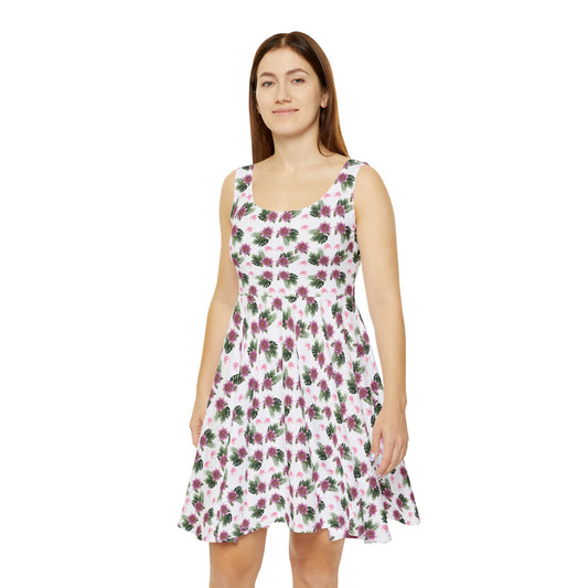 Woman wears the Moni Lee Pink flower summer dress white