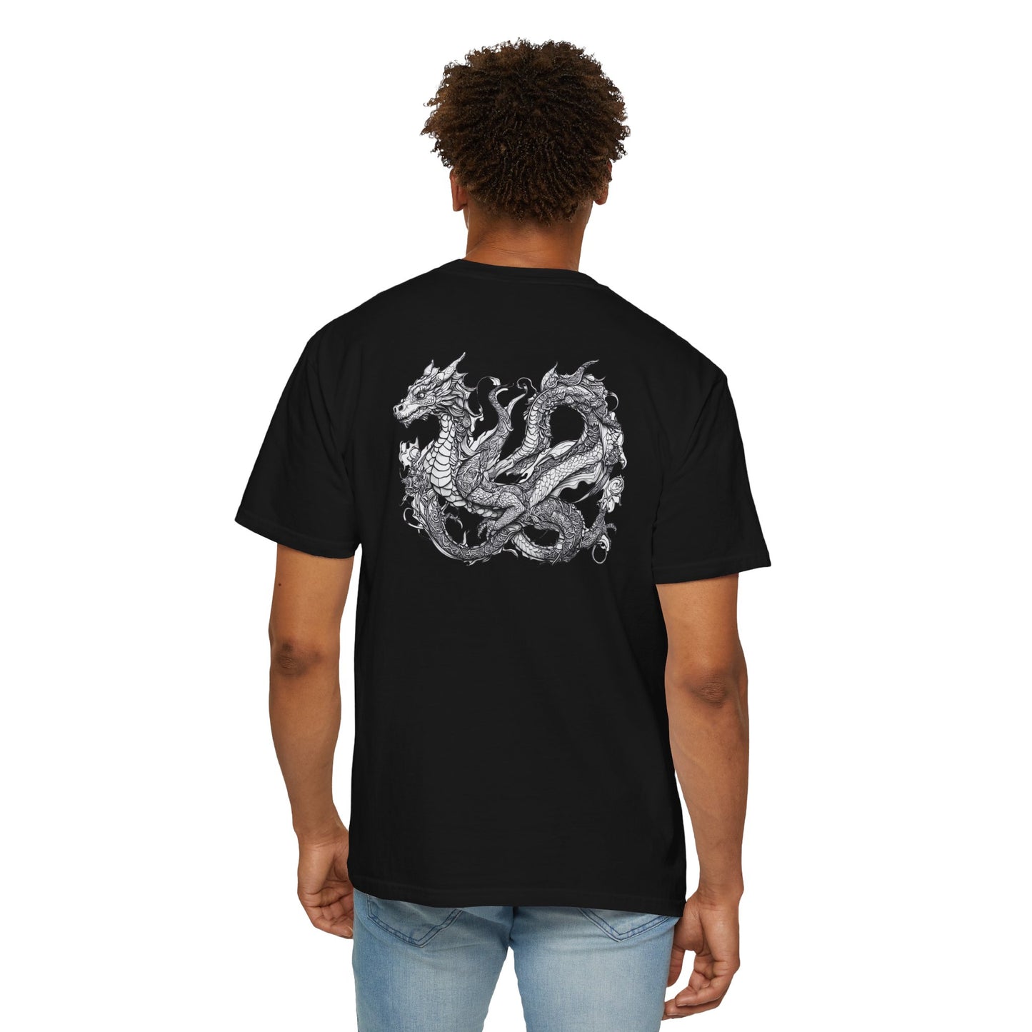 Person wearing a black t-shirt with a silver dragon design on the back, standing against a white background.