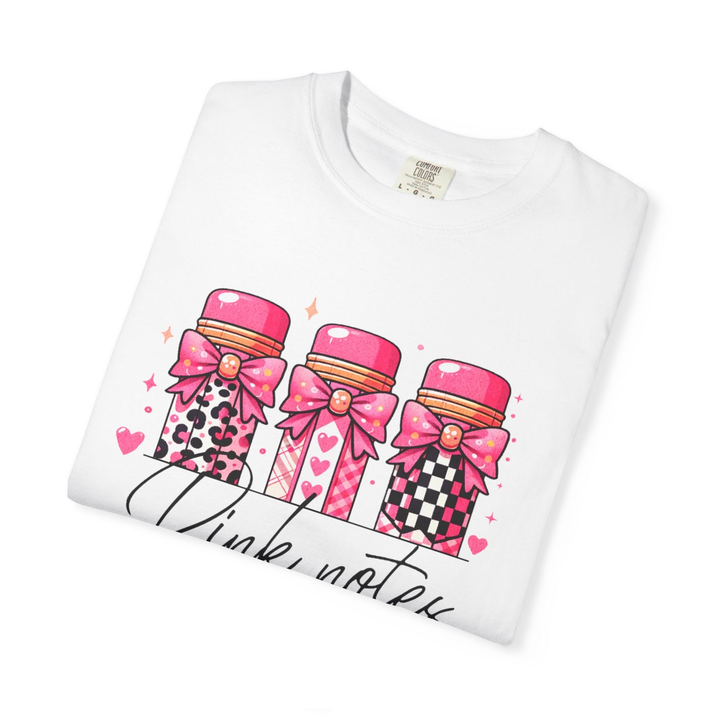 White sweatshirt with pink notebook design and text on a white background