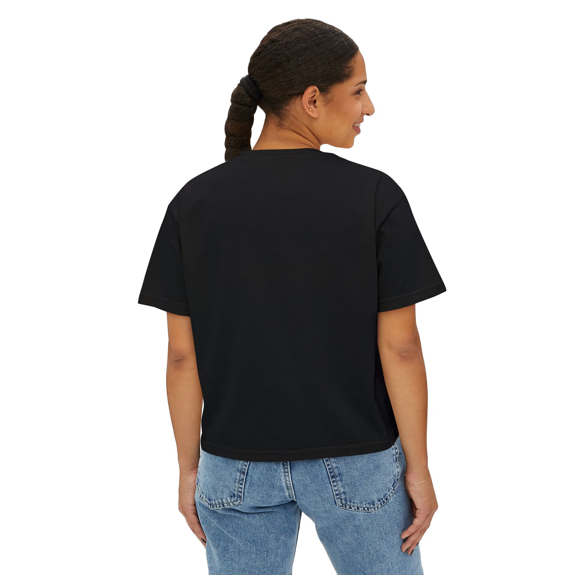 Person wearing a black t-shirt and blue jeans on a white background