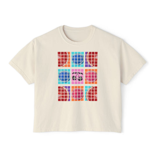 Ivory t-shirt with colorful geometric pattern on a white background