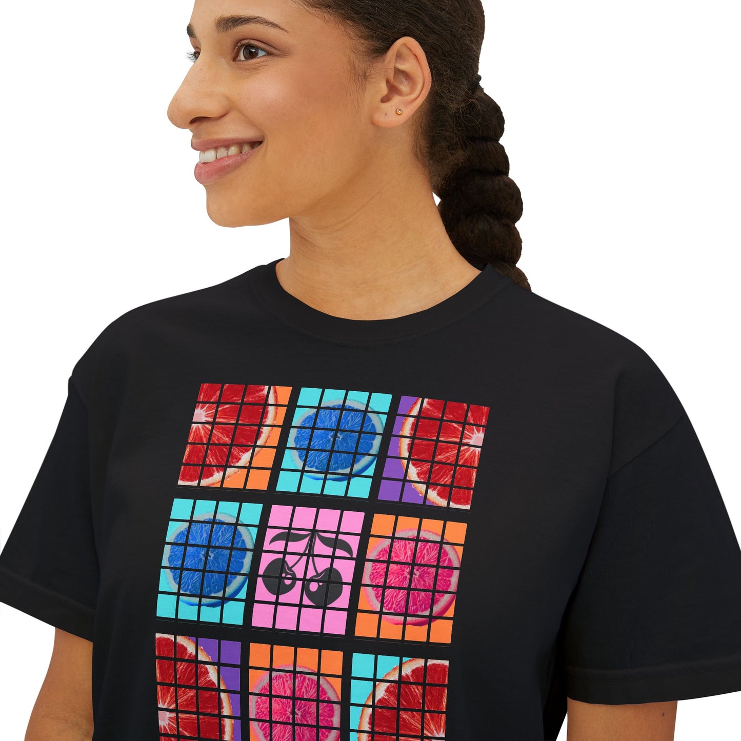 Person wearing a black t-shirt with colorful abstract design