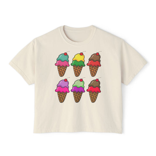 Beige t-shirt with colorful ice cream cone graphics on a white background