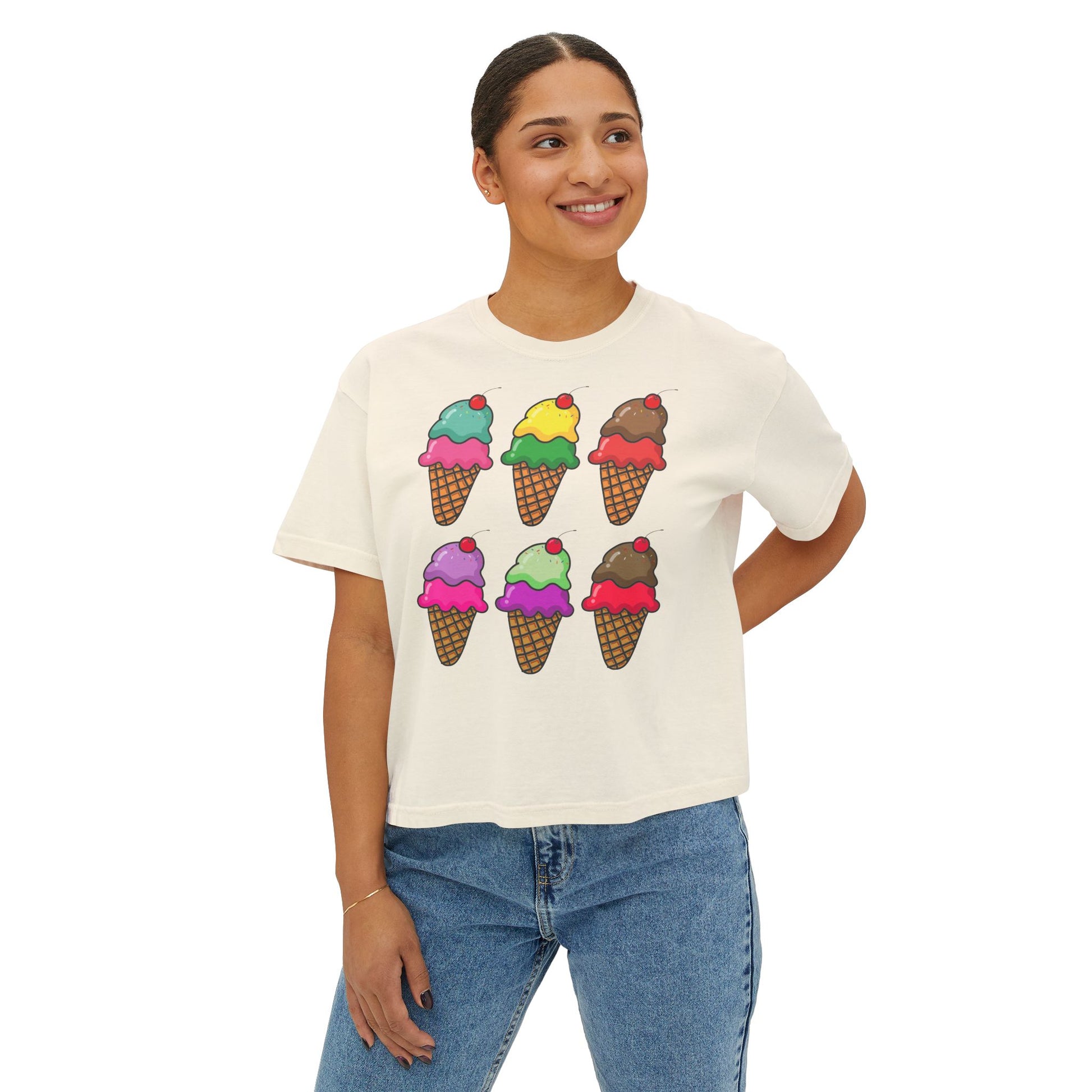Person wearing a white t-shirt with ice cream cone designs on a white background
