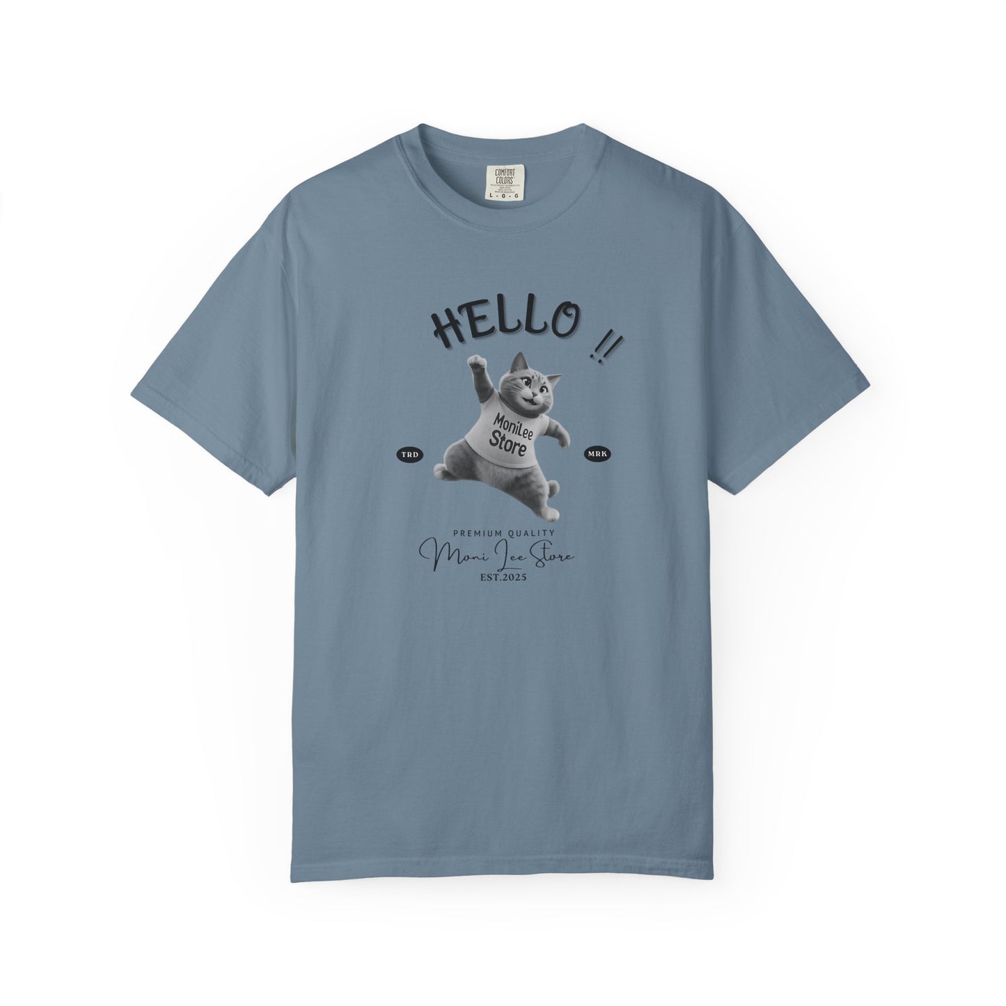 Moni Lee Cat printed on the front. Ice Blue short sleeved Tee.