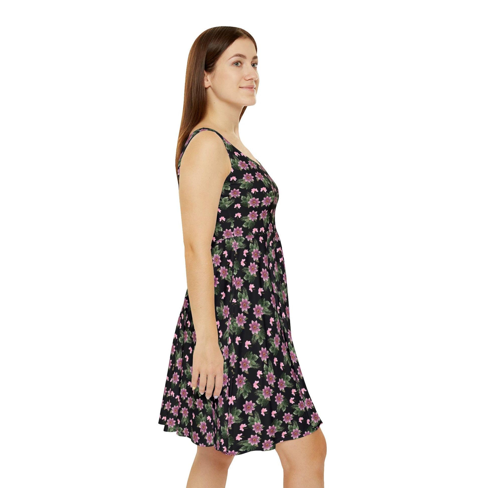 Woman wears the Moni Lee Pink flower summer dress black right side