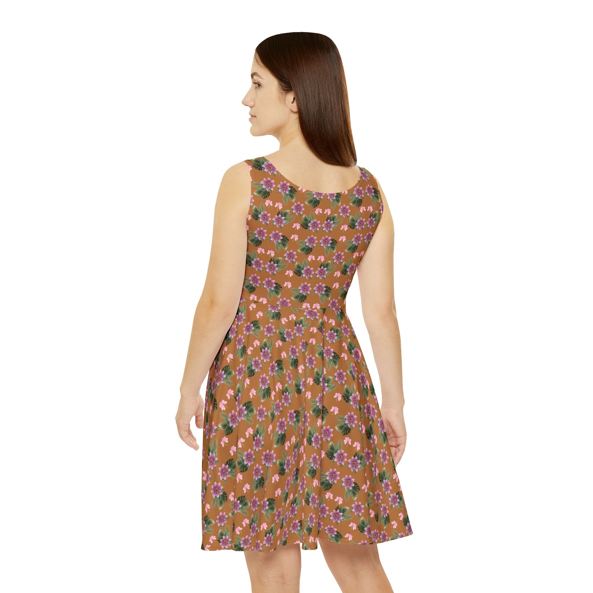 Woman wears the Moni Lee Pink flower summer dress brown back