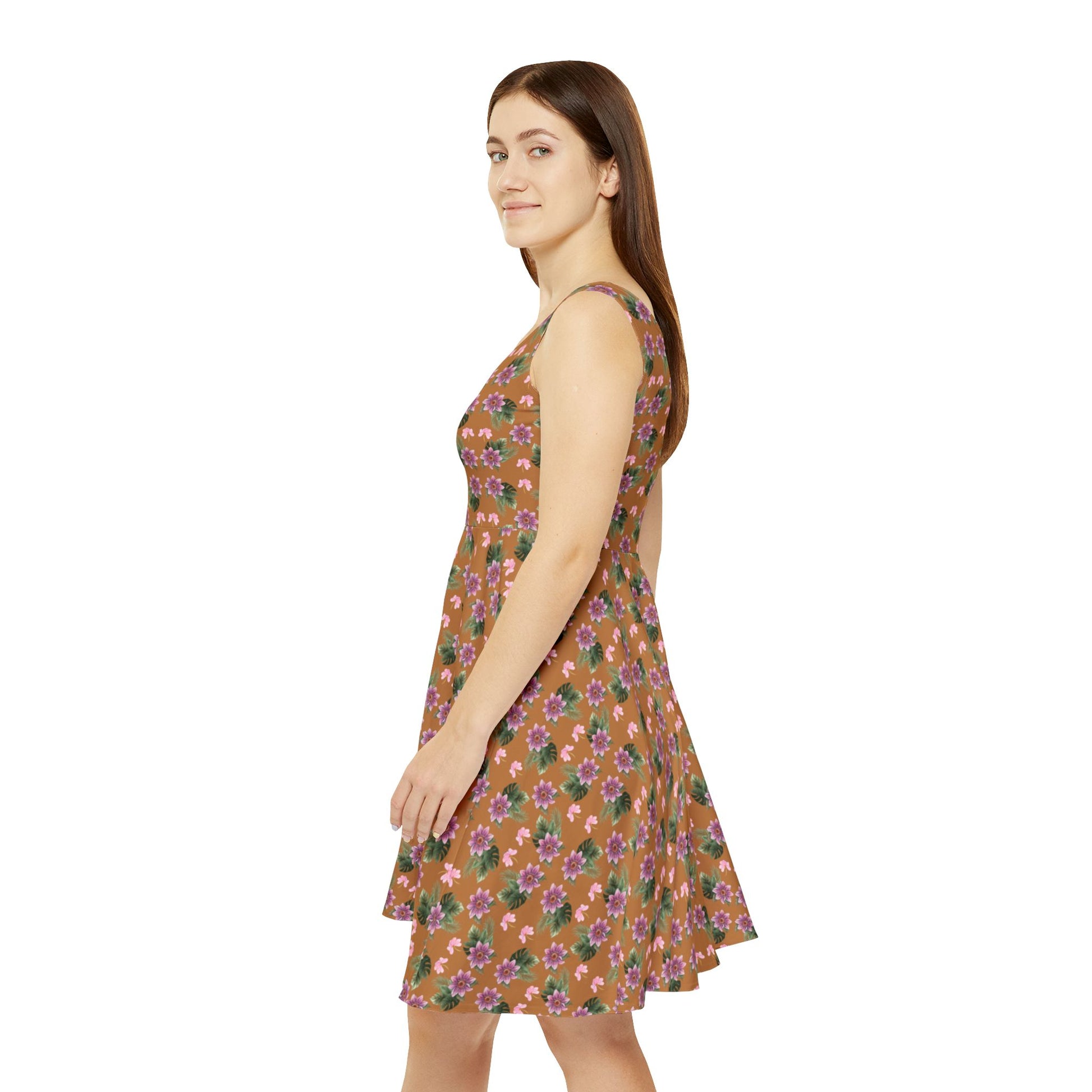 Woman wears the Moni Lee Pink flower summer dress brown left side