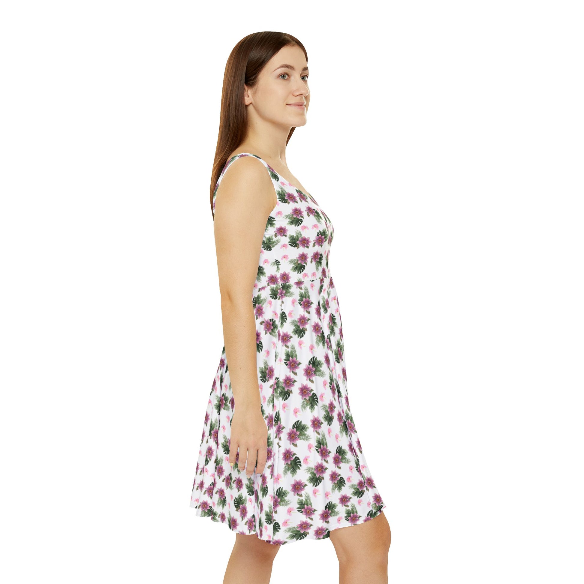 Woman wears the Moni Lee Pink flower summer dress right side white