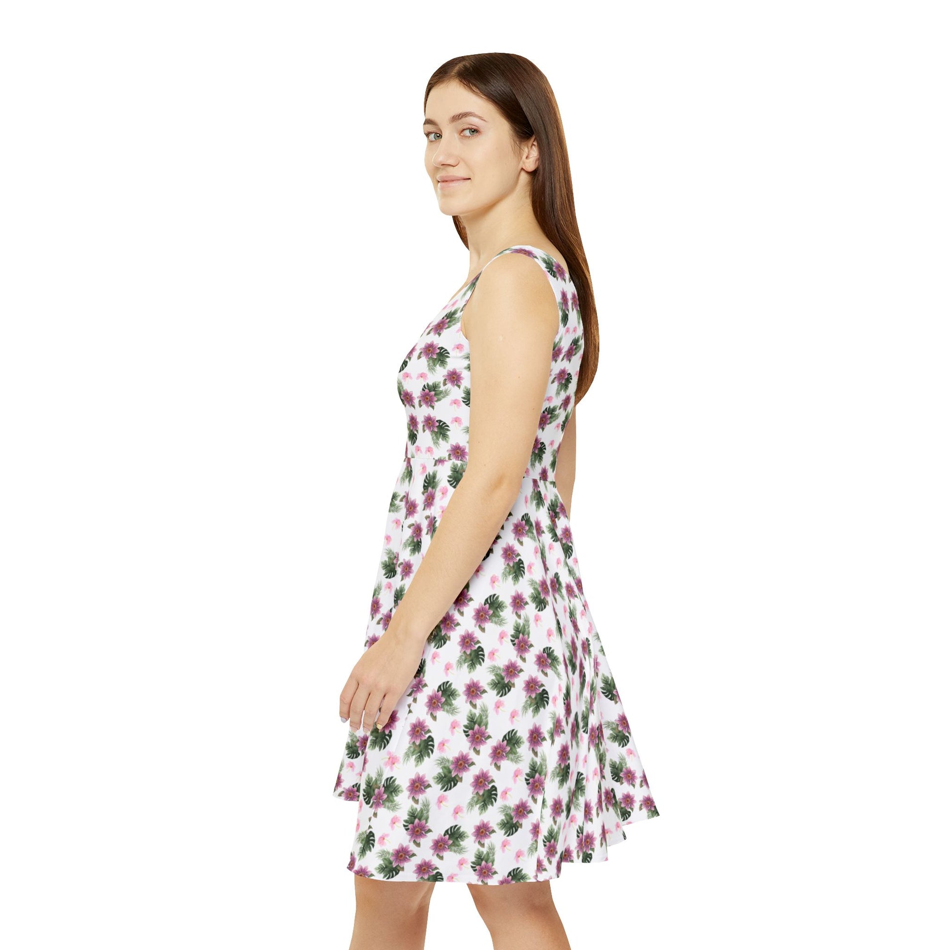 Woman wears the Moni Lee Pink flower summer dress  left side white