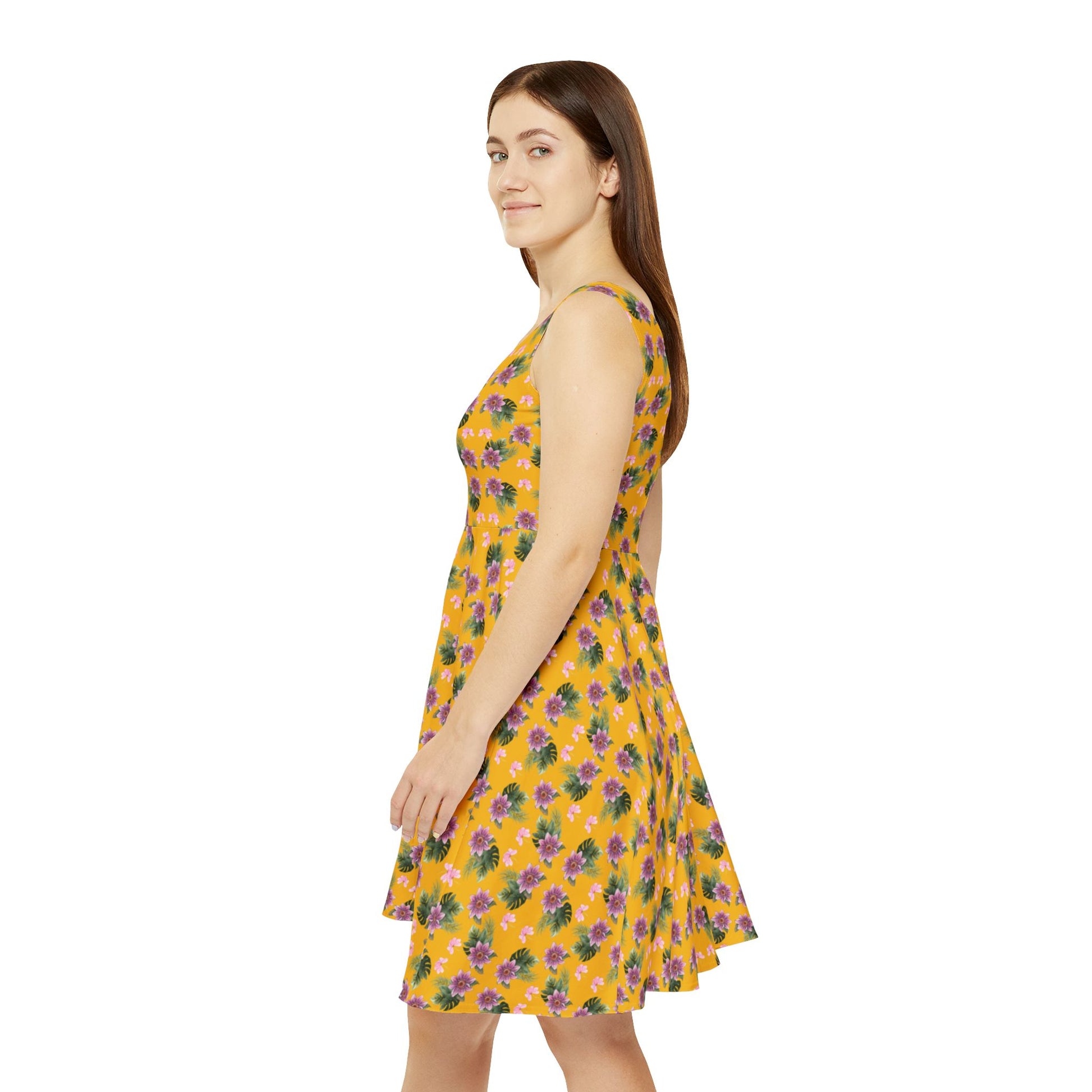 Woman wears the Moni Lee Pink flower summer dress yellow left side