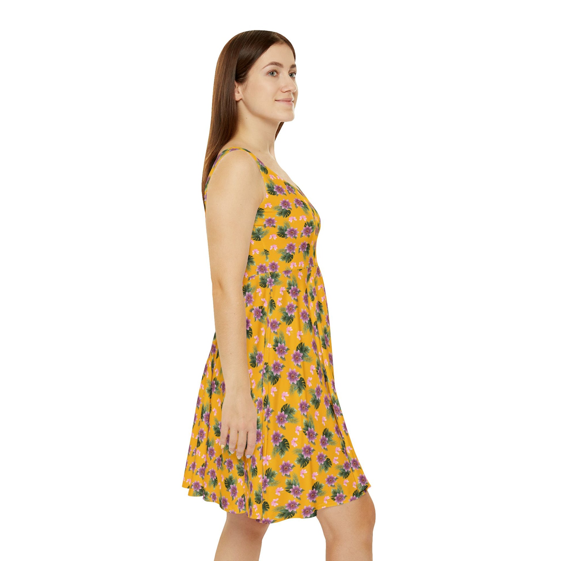 Woman wears the Moni Lee Pink flower summer dress  yellow right side