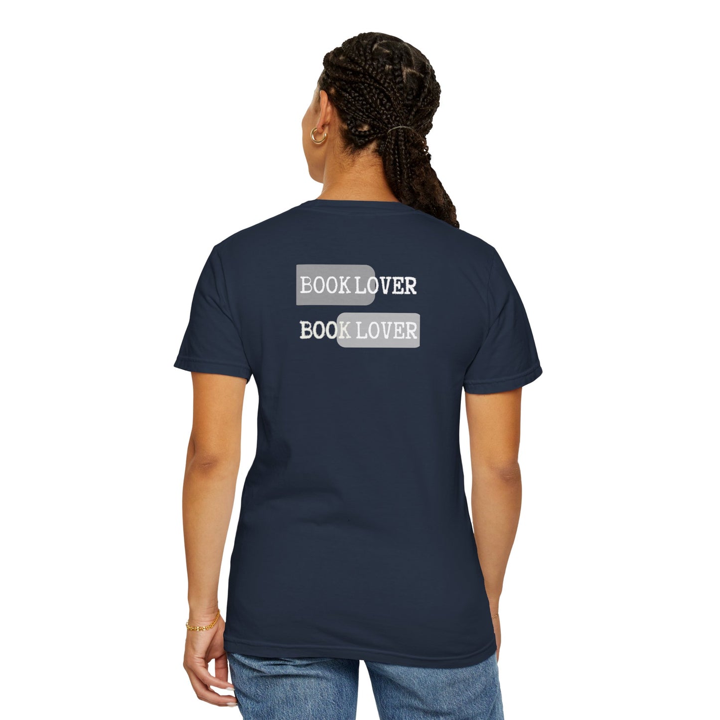 Person wearing a navy blue t-shirt with 'BOOK LOVER' text on the back, on a white background