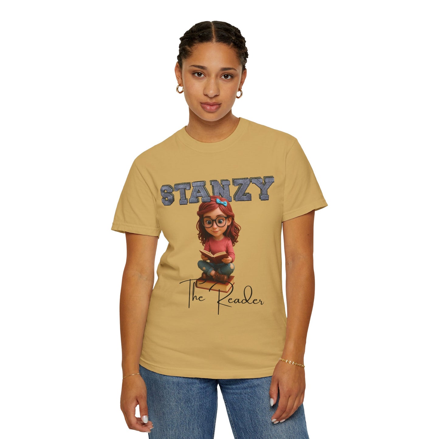 Person wearing a tan t-shirt with 'STANZY The Reader' design on a white background