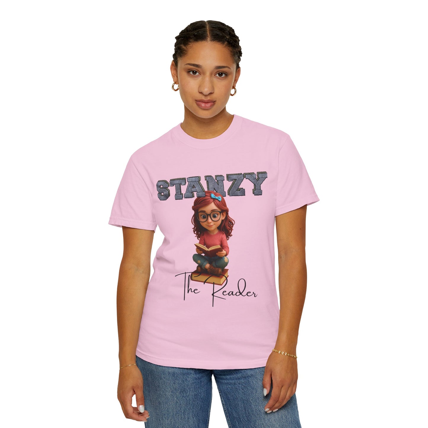 Person wearing a pink t-shirt with 'STANZY The Reader' design on a white background